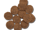 a pile of dark brown kibble. Dry dog food Whole Food Clusters from The Honest Kitchen.