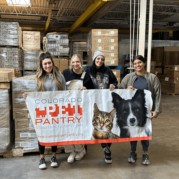 Members of The Honest Kitchen team volunteering at the Colorado Pet Pantry. Our Impact.
