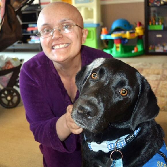 Odetta visits Madison, a pediatric cancer patient in 2011.