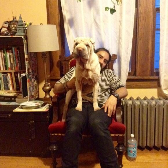 After: Happy to sit on Dad in his fancy chair.