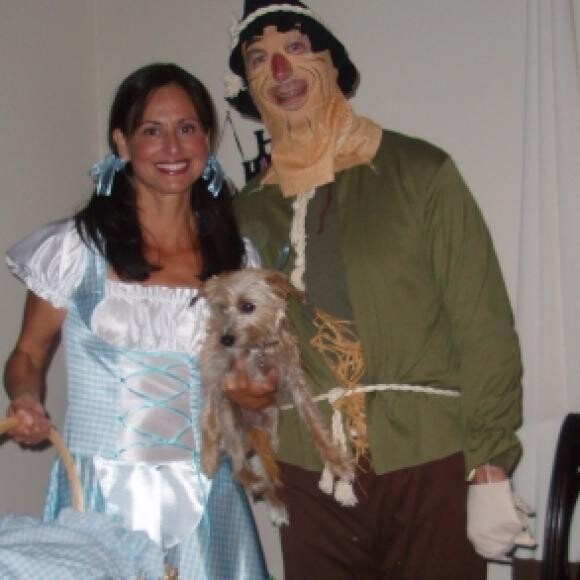 Enid, mom and pop at Halloween...she was doing her Toto impression!