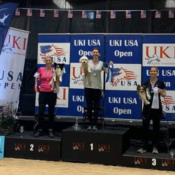 On the podium, winning the national championship at the US Open