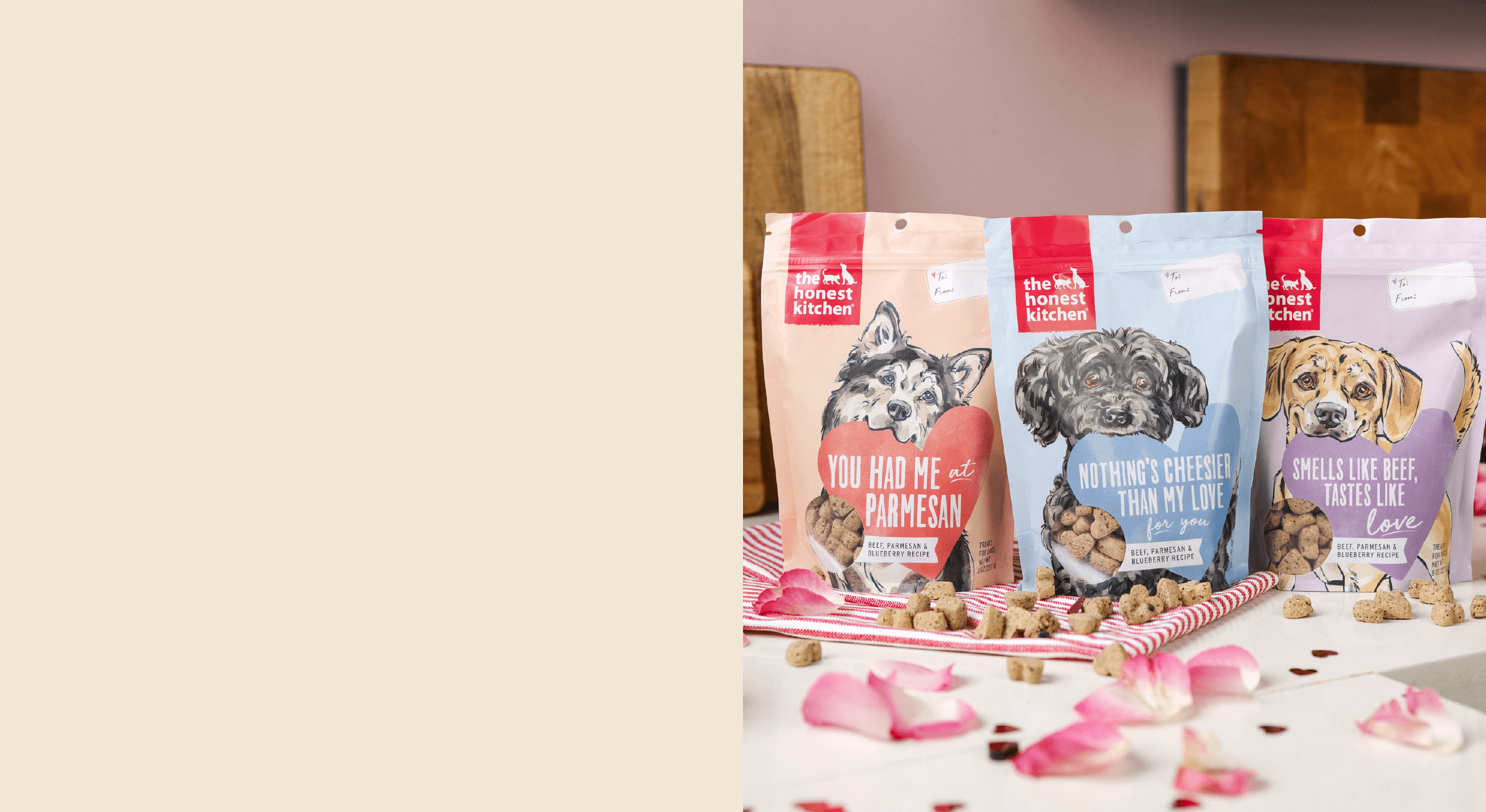 Valentines dog treats sitting on a counter with rose petals and a towel.  Healthy, high quality, human grade food for dogs and cats.
