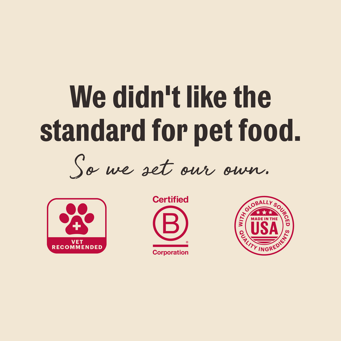 A beige promotional graphic with the text 'We didn't like the standard for pet food. So we set our own.