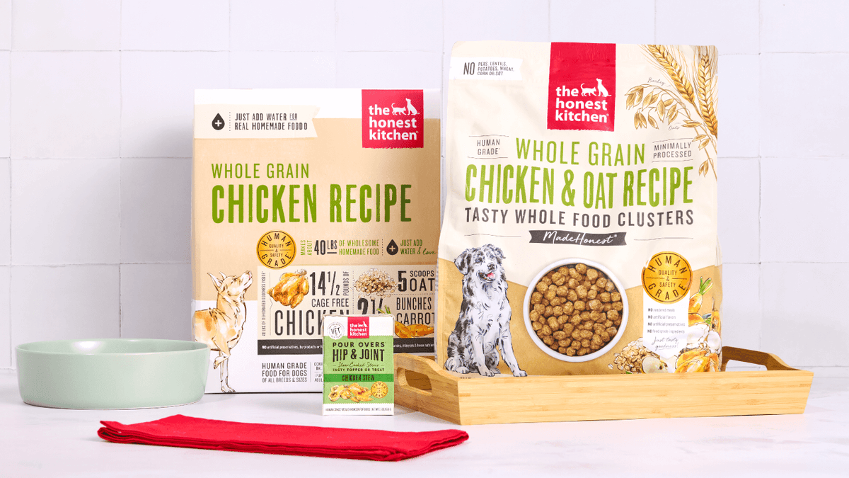 The Honest Kitchen Whole Grain Chicken Dog Food dehydrated recipe next to The Honest Kitchen Whole Grain Whole Food Clusters Dog Food recipe. Healthy, high quality, human grade dog and cat food.