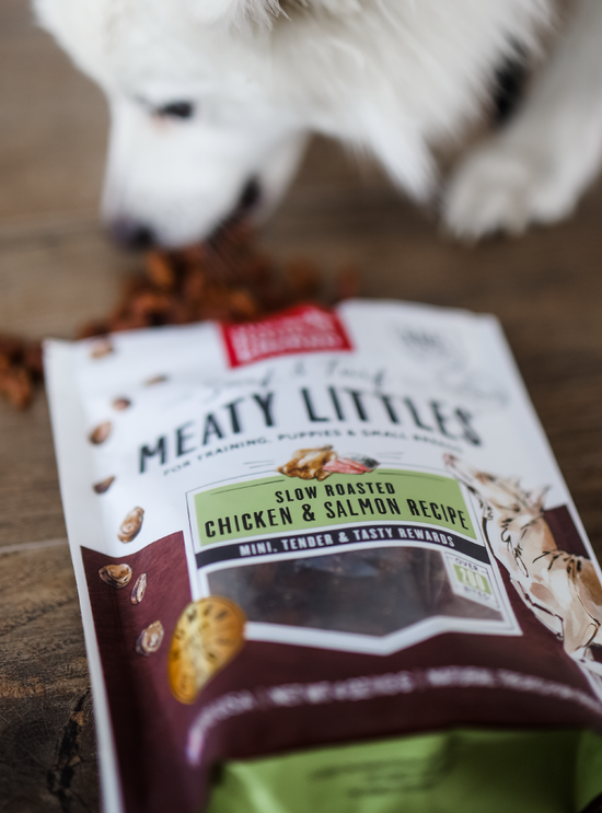 "Meaty Littles" dog treats, perfect for training puppies and small breeds, offer a slow-roasted chicken and salmon recipe in mini, tender, and tasty rewards. Healthy dog treats from The Honest Kitchen.